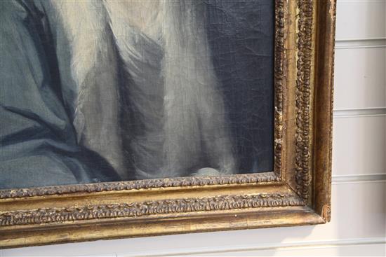 Early 18th Century English School Portrait of a lady wearing a blue dress and pearls in her hair 27 x 21in.